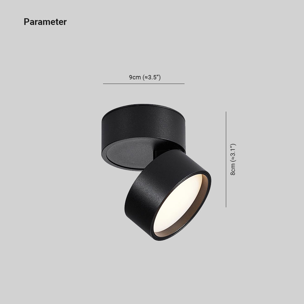 Novak drawing labels a 9 cm round base width and an 8 cm vertical dimension beside a tilted black head; wattage is unmarked.