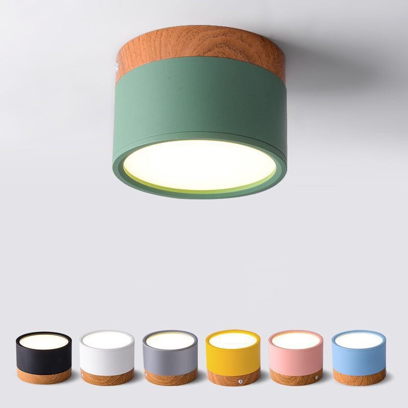 Morandi green ceiling cylinder and smaller neutral and pastel finish views, showing wood-look bands and round faces.
