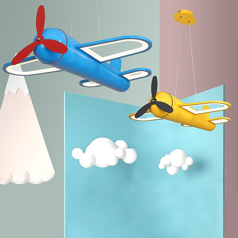 Blue and yellow Minori airplane pendants shown together against a pastel background.
