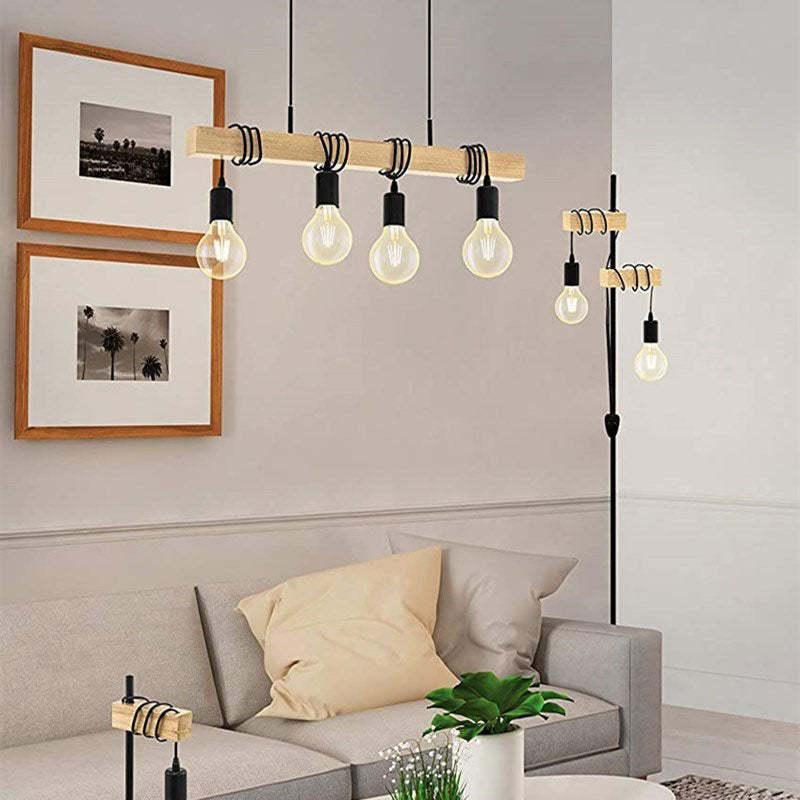 Alessio beam pendant shown among other light configurations in a living room display.
