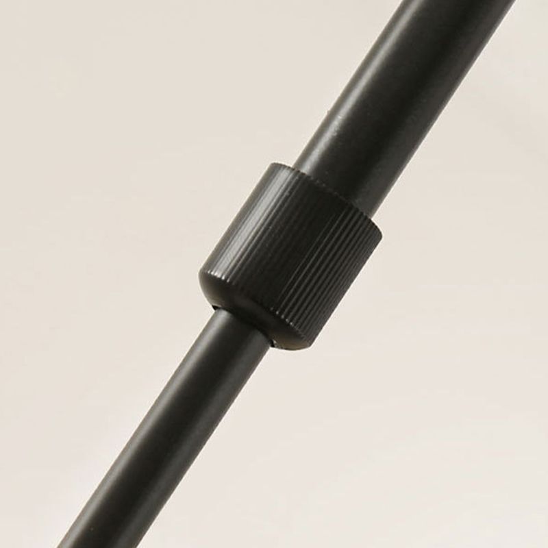 Close-up of a knurled connector on a Black suspension rod