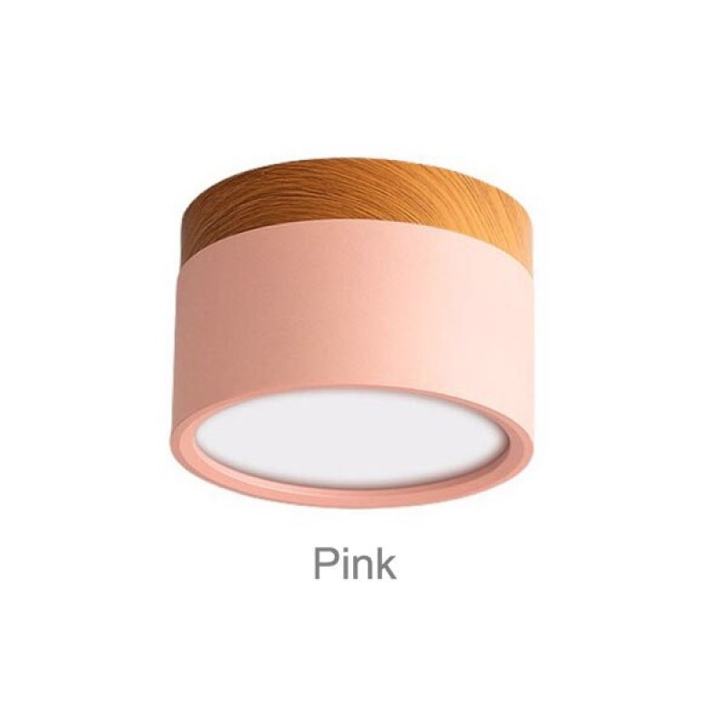Pink Morandi cylinder with wood-look upper trim and pale circular face, labeled Pink on white backdrop.