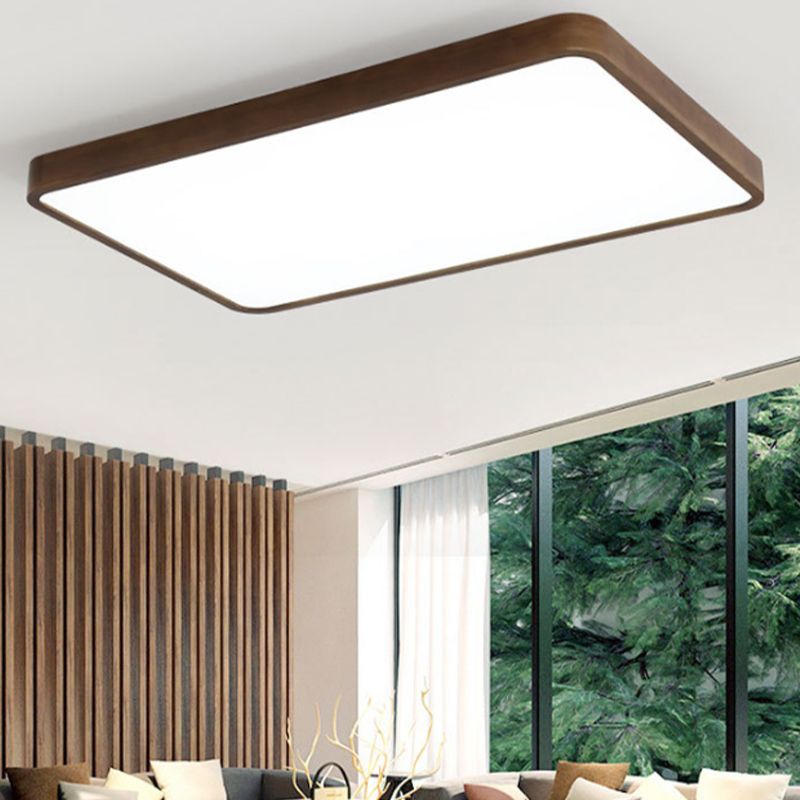 Rectangular Style B Ozawa ceiling light beside vertical wood slats and a large dark-framed window overlooking trees.