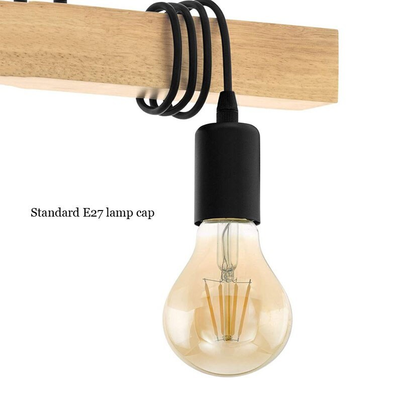 Close view of black cord wrapped around the wood beam and a holder labelled Standard E27 lamp cap.