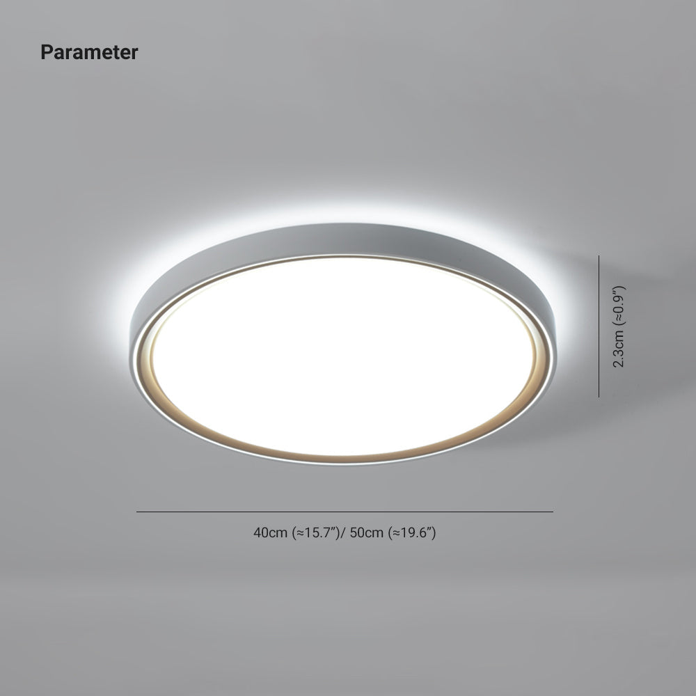 Quinn round parameter drawing: 40 or 50 cm diameter, approximately 15.7 or 19.6 inches; 2.3 cm height, approximately 0.9 inches.