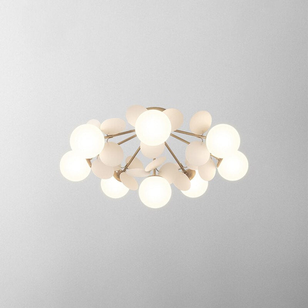 Jevon White 28.3-inch 8-light option seen from below, with white globes and pale petals on branching gold-tone rods.