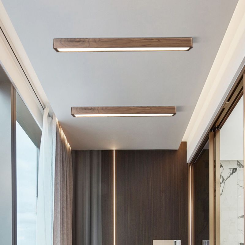 Two linear Ozawa ceiling lights along a narrow hallway