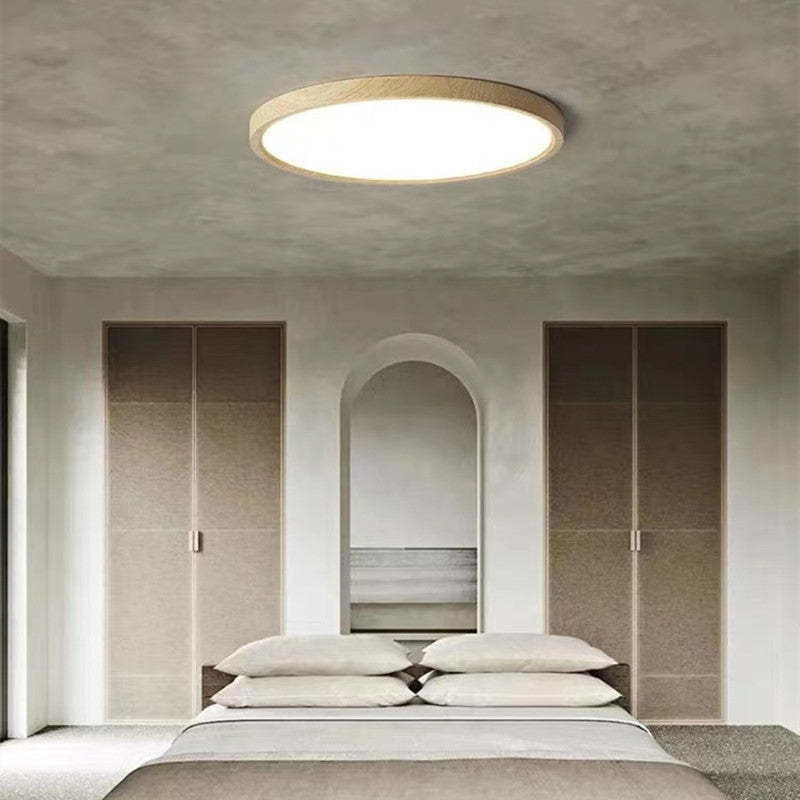 Ozawa ceiling light in a bedroom with an arched wall recess