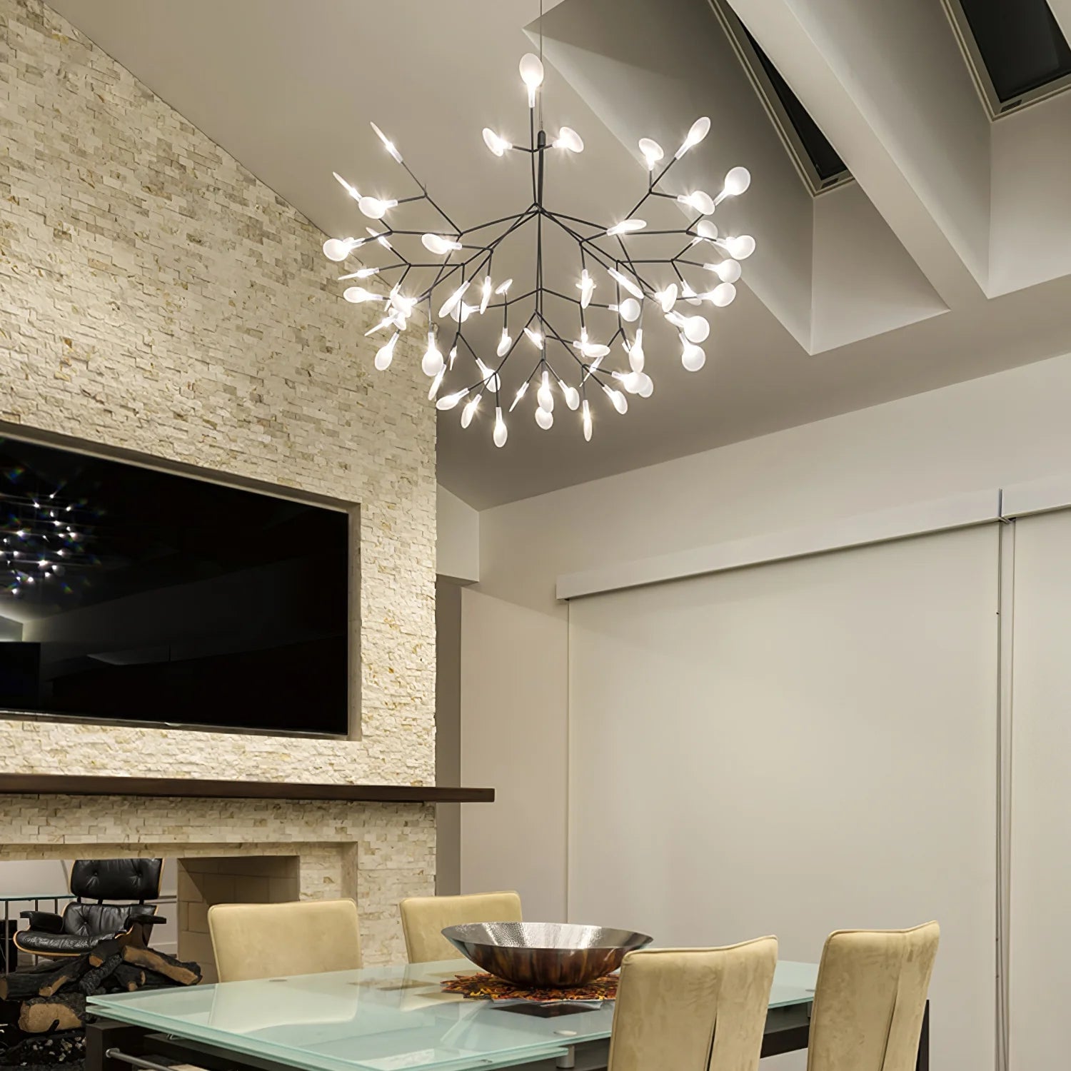 Large black firefly chandelier in a dining room
