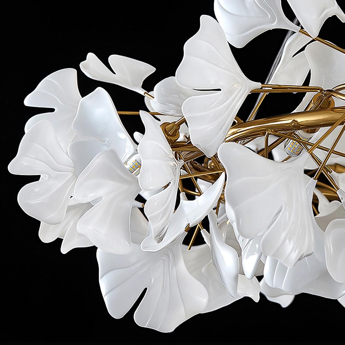 Sculpted veins and fan-shaped edges of white ceramic leaves