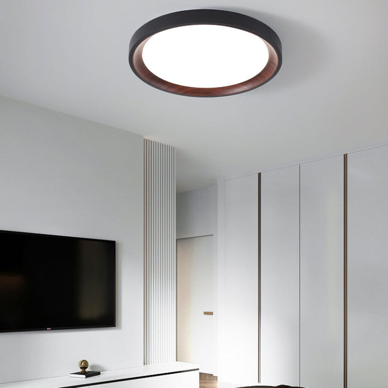 Dark wood and white Quinn ceiling light near a wall-mounted television