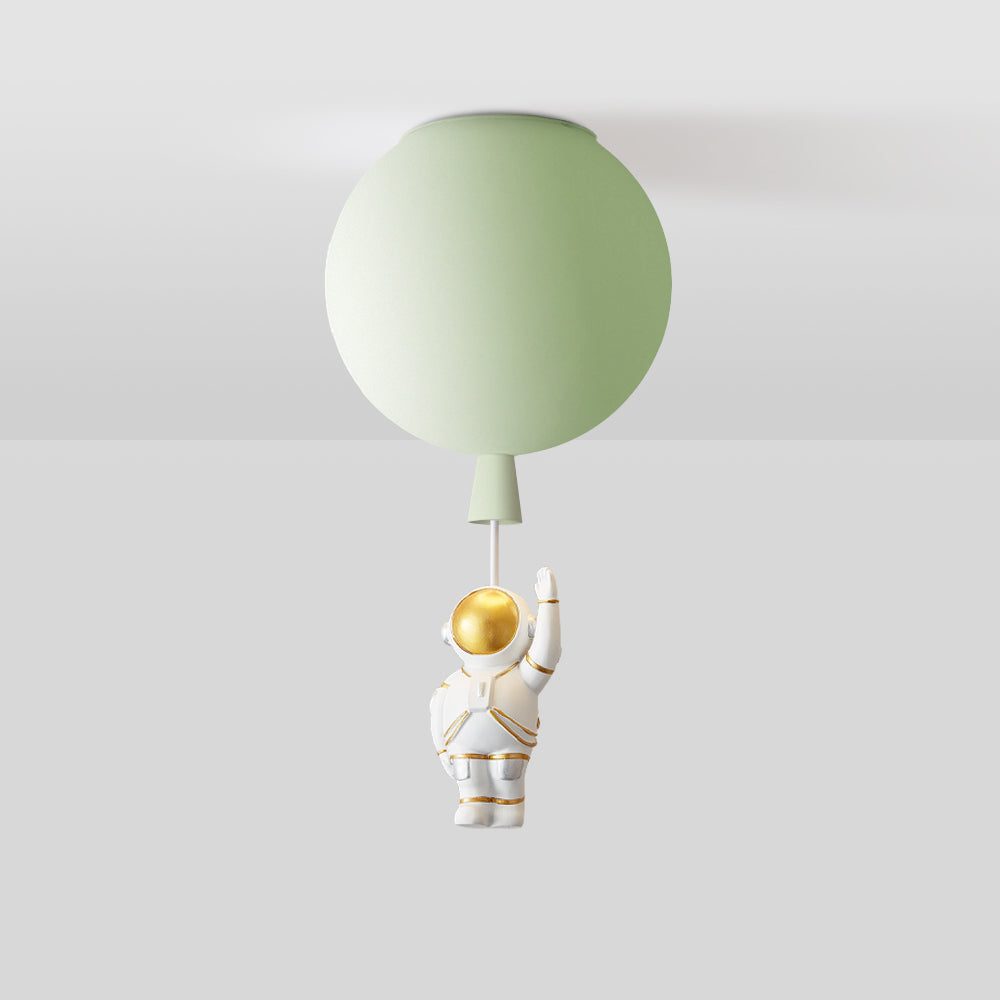 Cropped pale green balloon globe with a tapered lower detail and a short pale link; the astronaut is outside the image.
