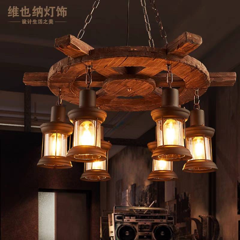 Close room view of the Austin wooden wheel and illuminated lanterns