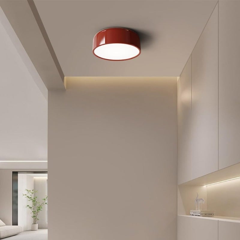 Red Morandi round ceiling light in a pale modern room