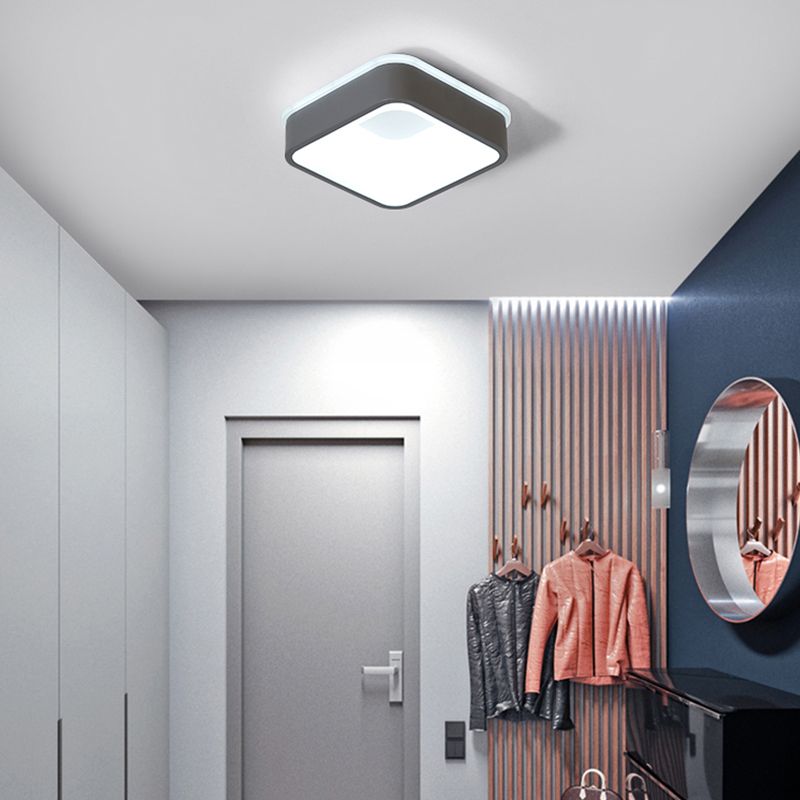Gray Quinn square ceiling light above an entryway coat stand