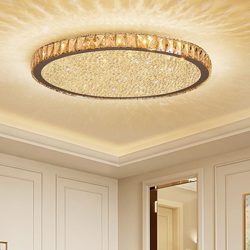 Warmly illuminated Kristy fixture with light patterns on the ceiling