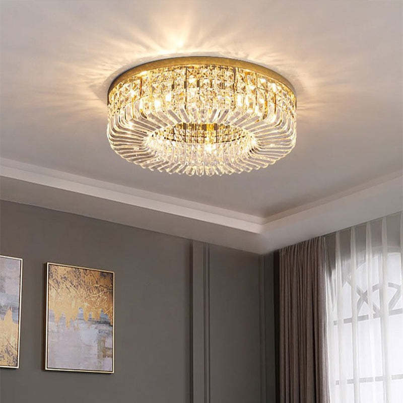 Golden Marilyn above a gray-panel corner with gold-and-gray artwork, gray curtains and a white sheer window with curved lines.
