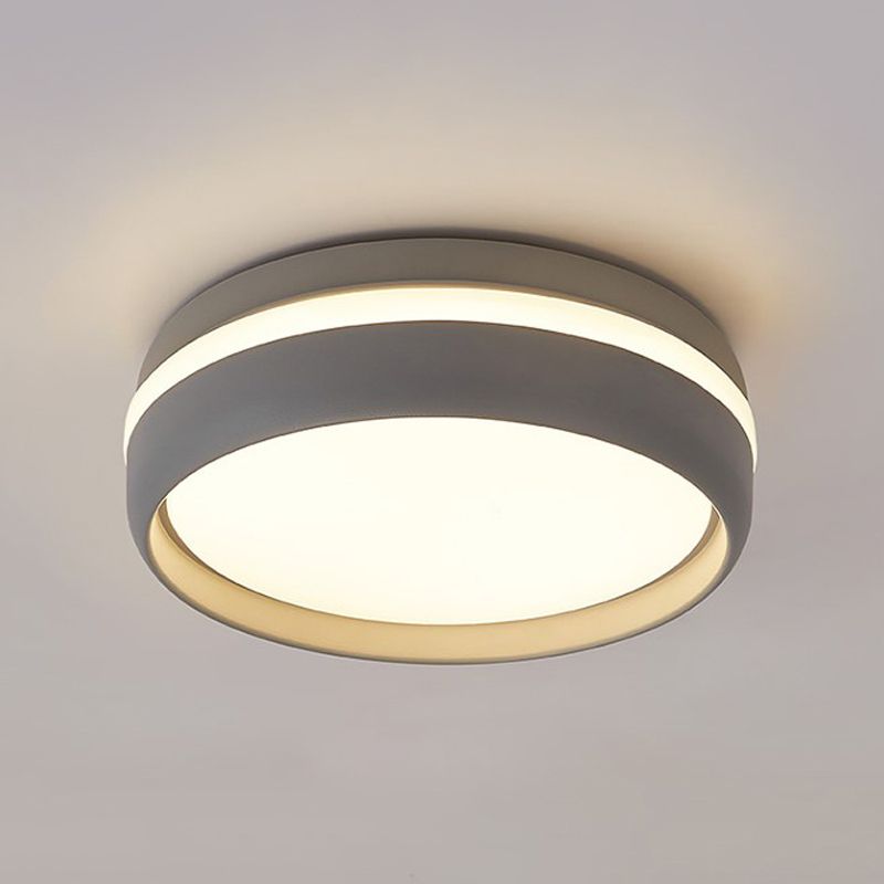 Grey Quinn ceiling light beneath a pale ceiling, showing the lit underside and thin illuminated upper band