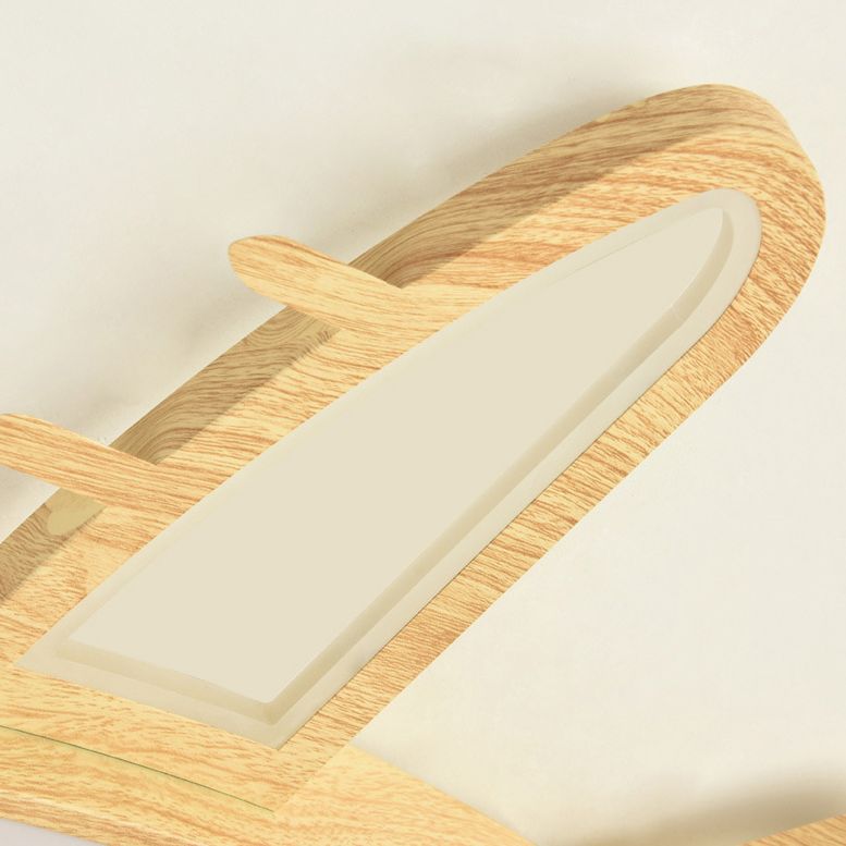 Close-up of Minori’s elongated wing, showing wood-grain borders, a pale panel and raised inner edge.