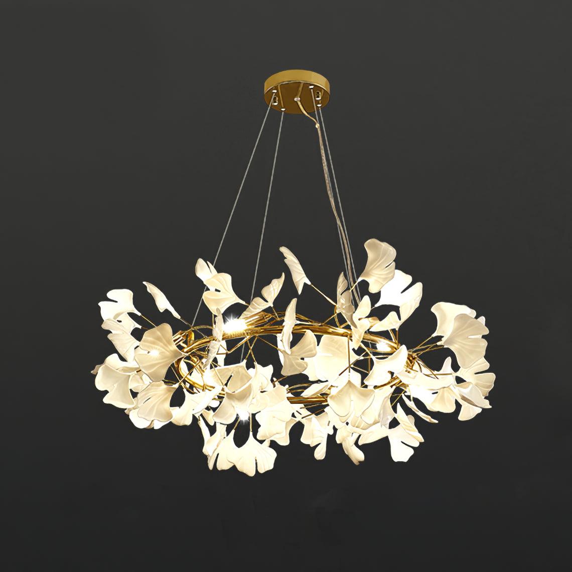 Gold-frame Olivia chandelier with illuminated white leaves