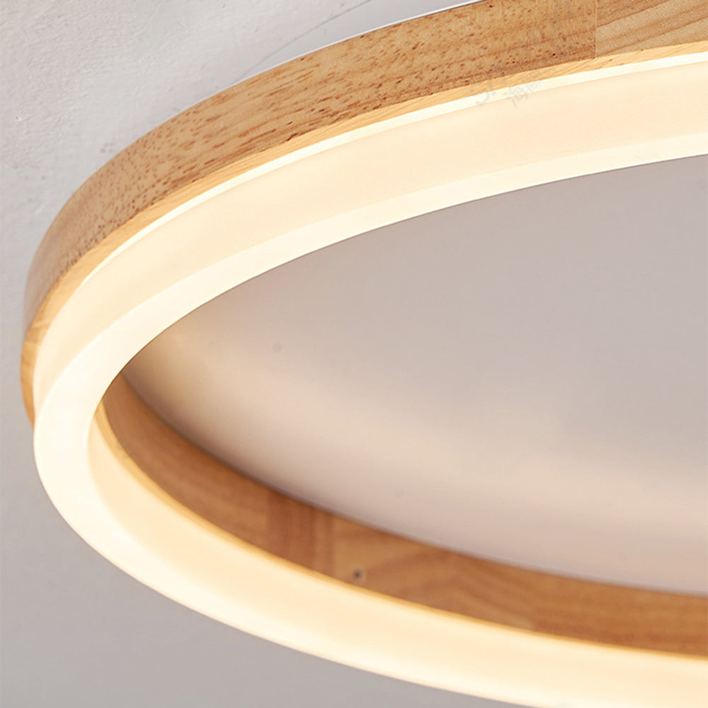Close view of the Ozawa wood grain and illuminated acrylic ring.