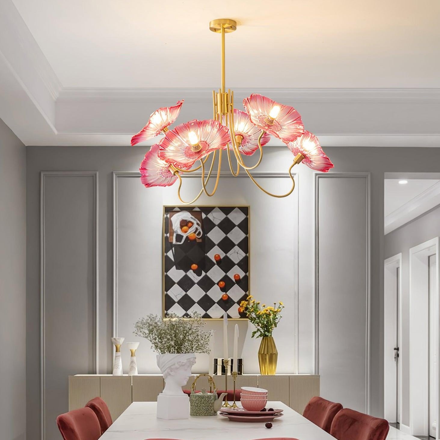 Pink flower chandelier above dining table