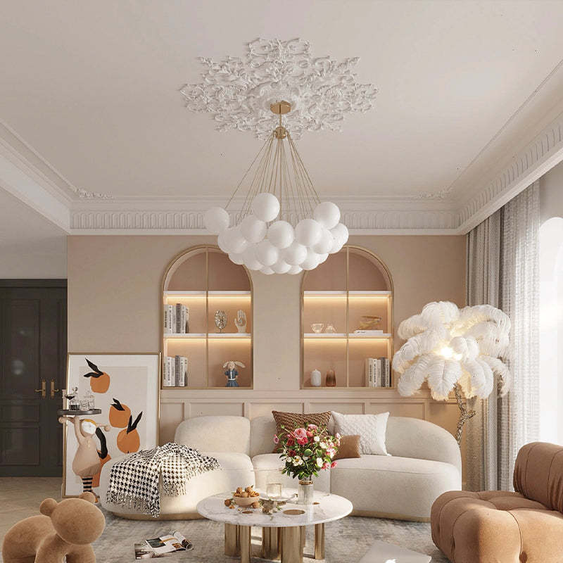 Gold globe-cluster pendant in a living room
