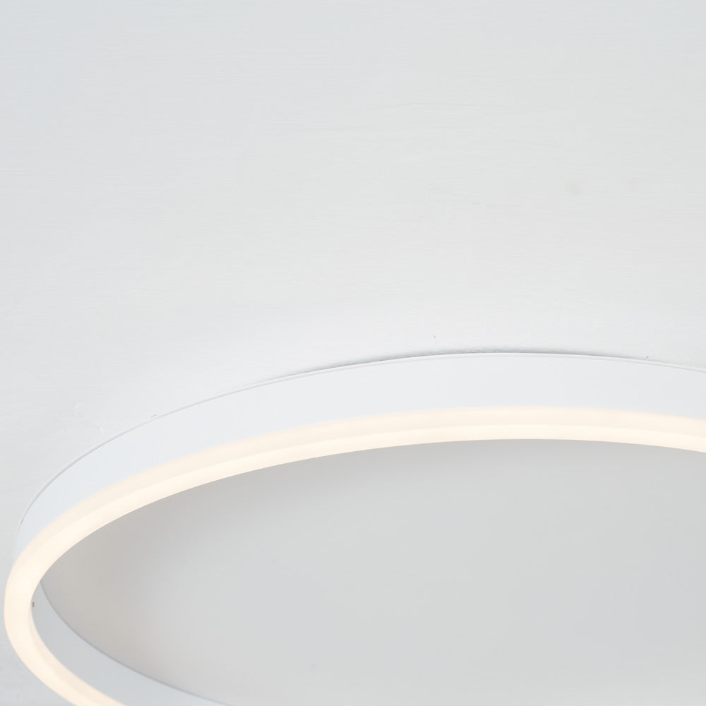 Close-up of white Arisha’s upper and right arc beside the plate outline, with a warm-looking light strip.