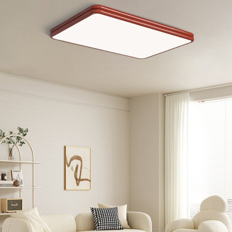Red Valentina rectangular ceiling light in a room with a large window