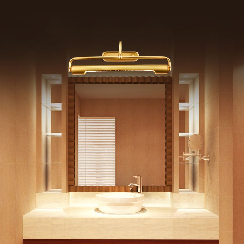 Eryn brass-tone hood and curved-arm wall light above a rectangular bathroom mirror and basin