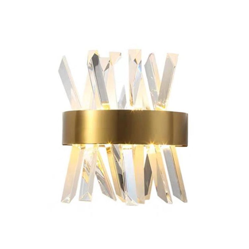Kristy L diagonal faceted clear prisms crossing above and below a gold-tone central band