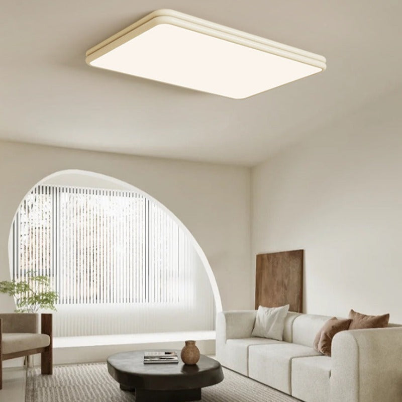 Cream-yellow square Valentina ceiling panel in a living room