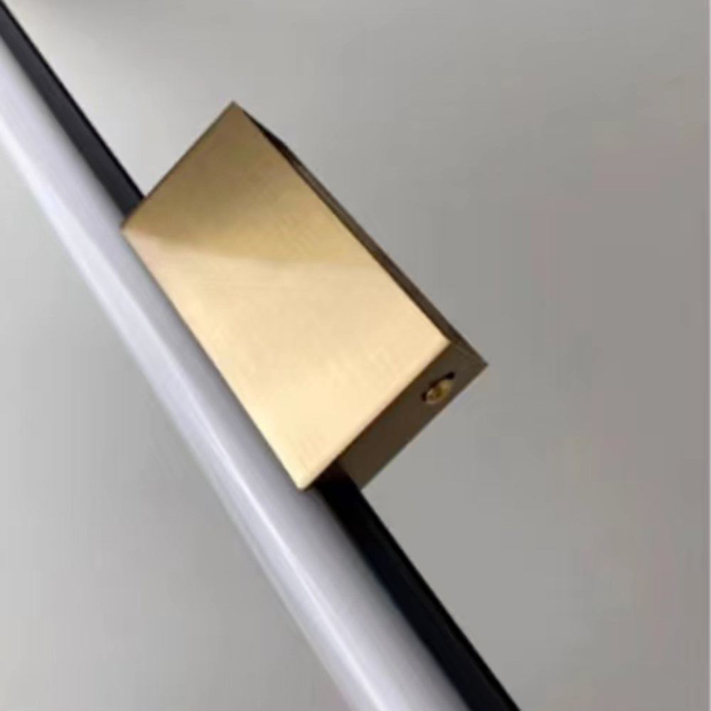 Gold-coloured mounting box behind the cylindrical diffuser