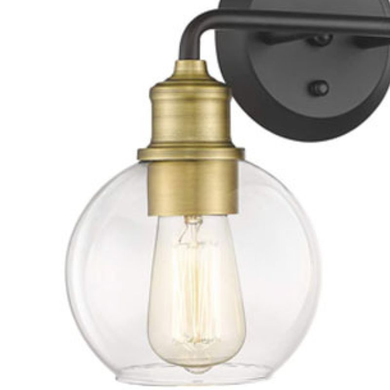 Alessio clear globe and gold-coloured bulb holder close-up