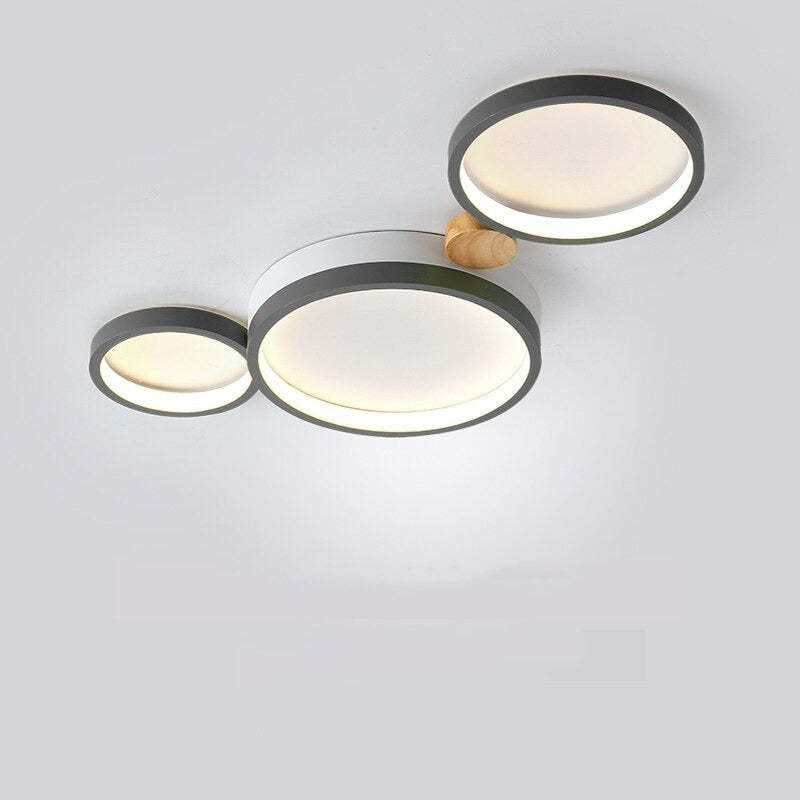 Gray three-head Sienna ceiling light with a large central disc and wood detail