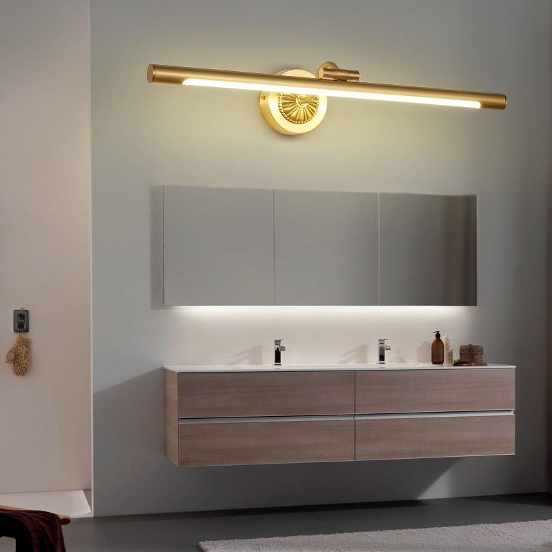 Eryn gold-colour LED bar with a fluted round plate above a wide bathroom mirror