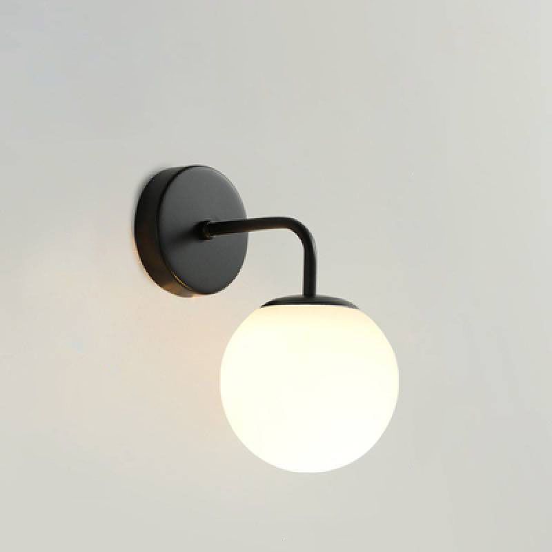 Black Valentina wall lamp with opaque white glass globe