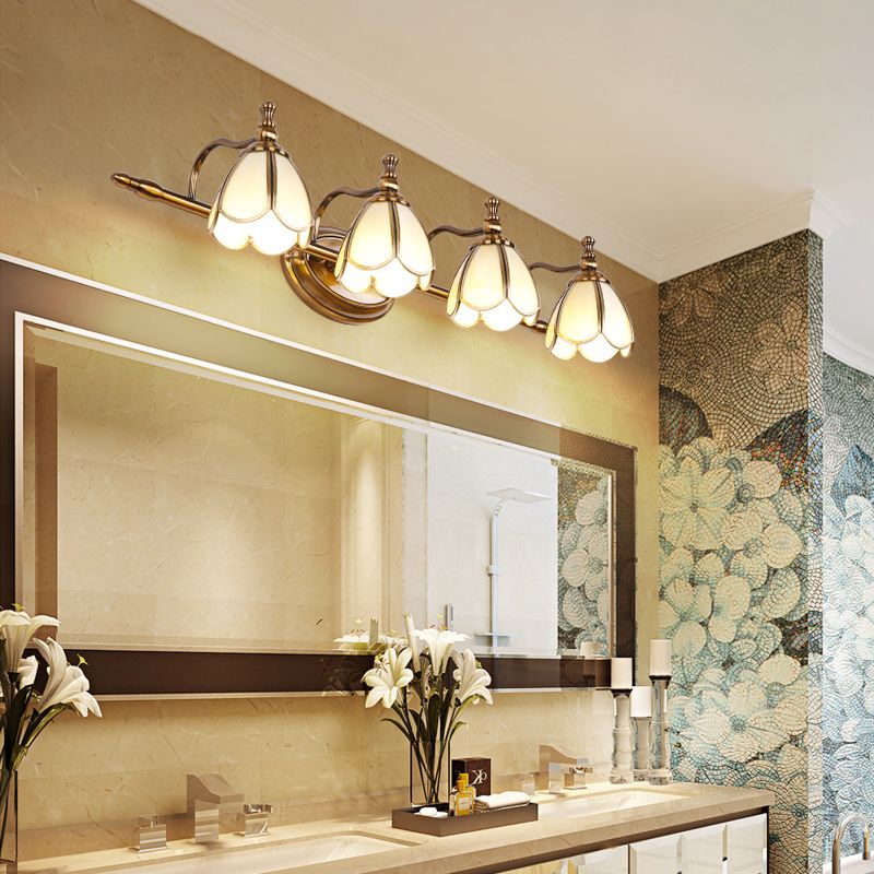 Félicie four-light floral glass fixture above a mirror