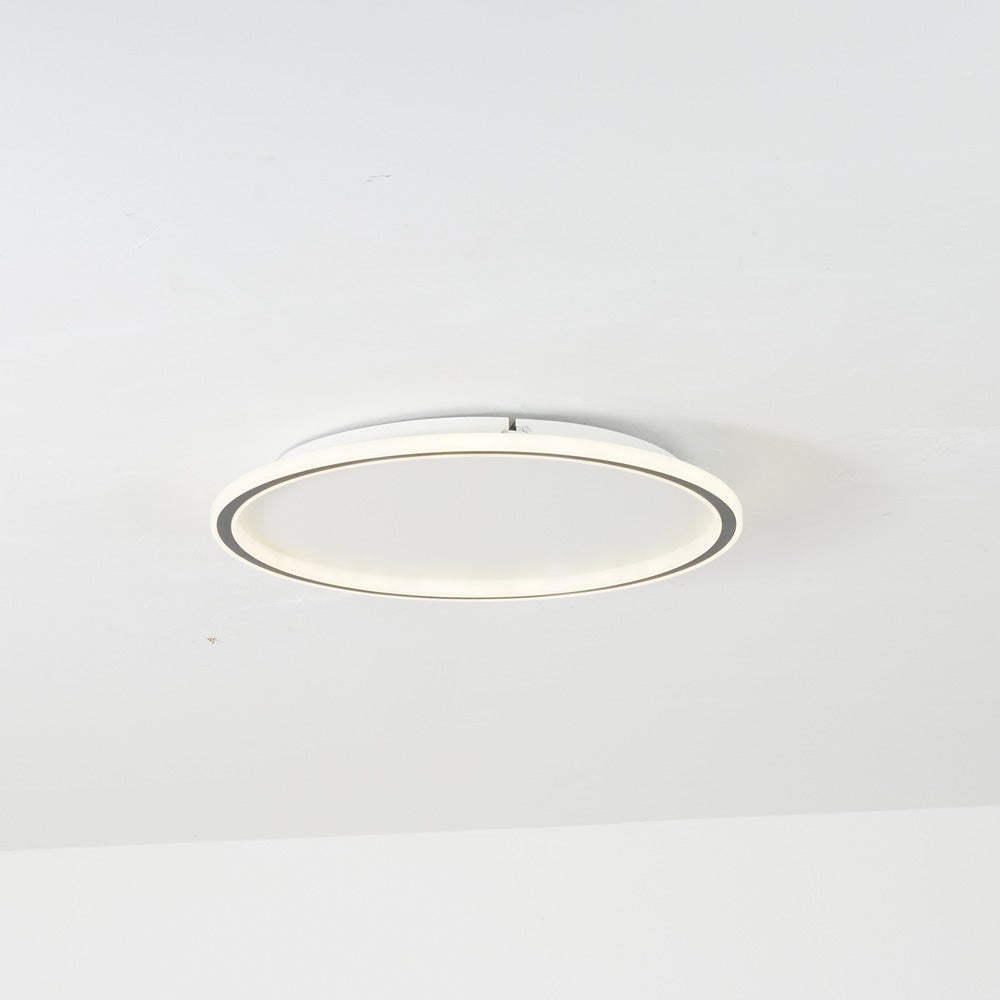Illuminated ceiling ring with White outer frame, Black inner band and a visible gap beneath the ceiling
