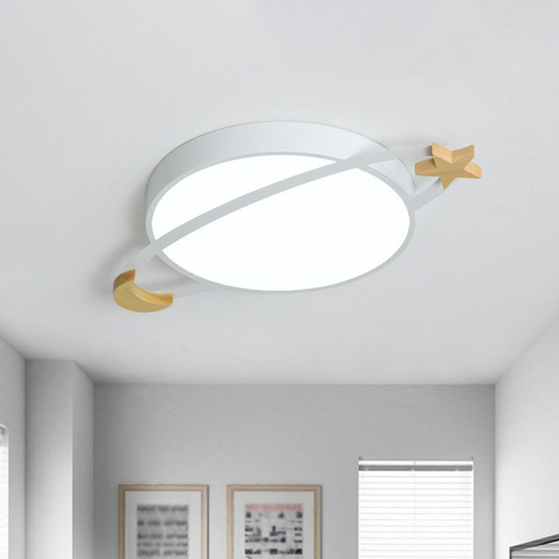 White Morandi planet light with wood-coloured star and crescent accents.