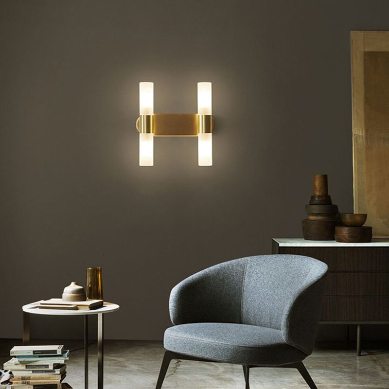 Leigh four-light wall-lamp assembly beside a chair
