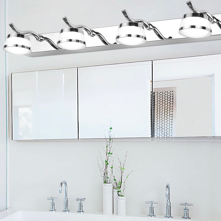 Four-light Leigh bar above a wide bathroom mirror cabinet.