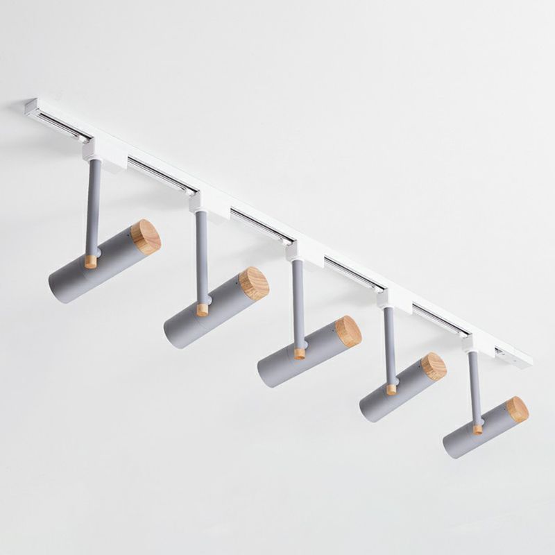 Gray five-head ceiling spotlight with wood caps, gray stems and light rail