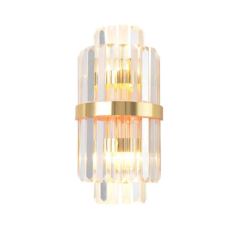 Kristy C faceted clear prisms with longer central sections and a gold-tone band