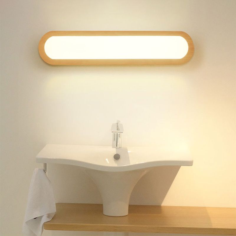 Ozawa wall lamp lit above a washbasin