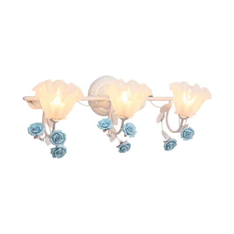 Félicie three-light blue rose fixture with upward flower shades