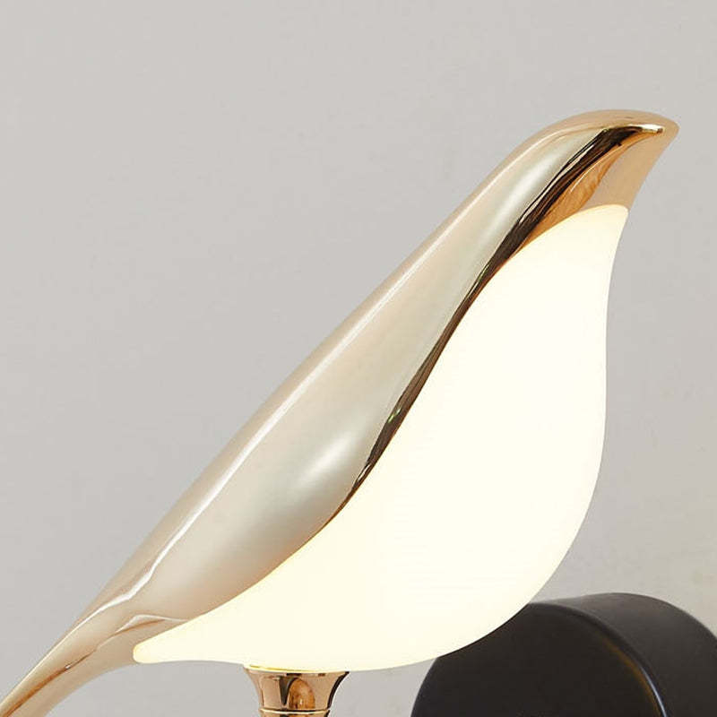 Close-up of Gold bird contour and pale acrylic light face