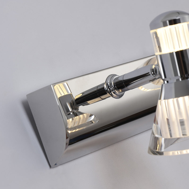 Close-up of Kristy straight silver arm, round attachment and reflective rectangular backplate