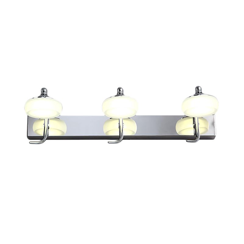 Leigh three glass heads and reflective curved arms on white