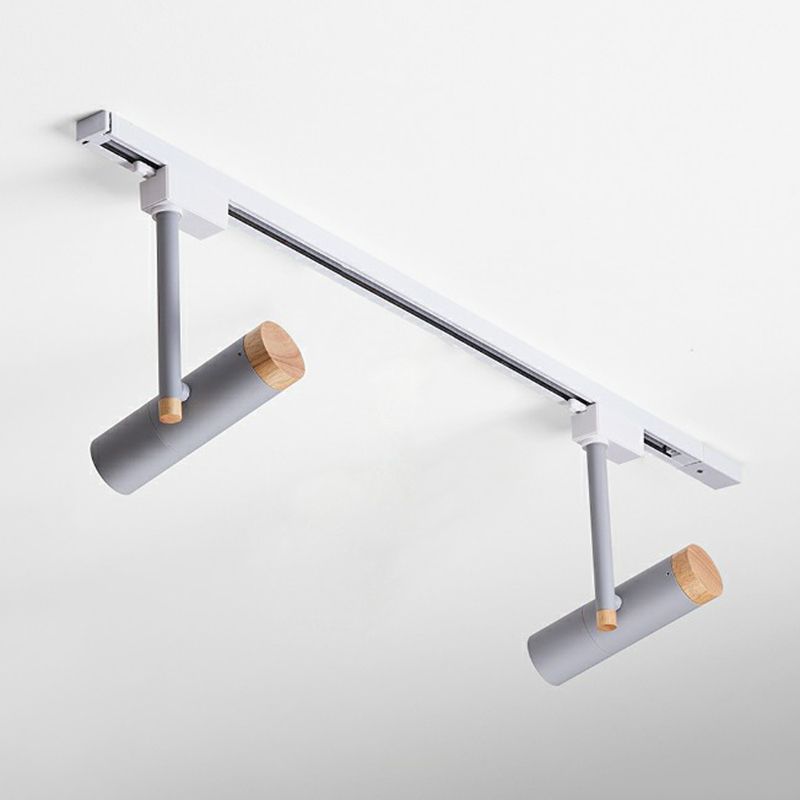 Gray two-head ceiling spotlight with wood caps and light ceiling rail